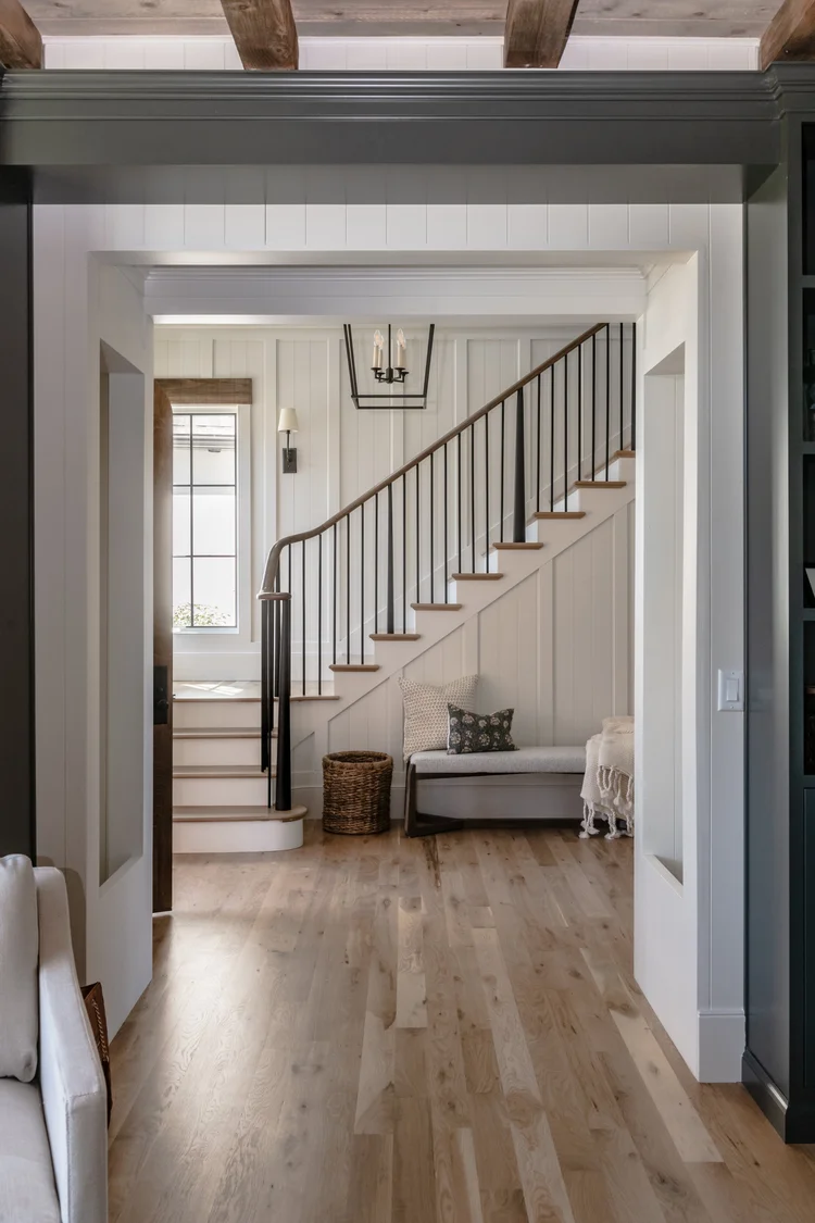 Finished hardwood and stair area in a luxury home